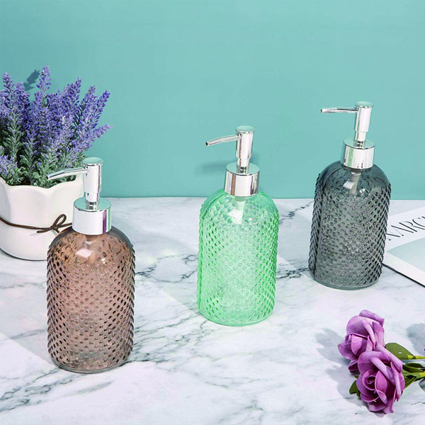 Separate glass lotion bottles