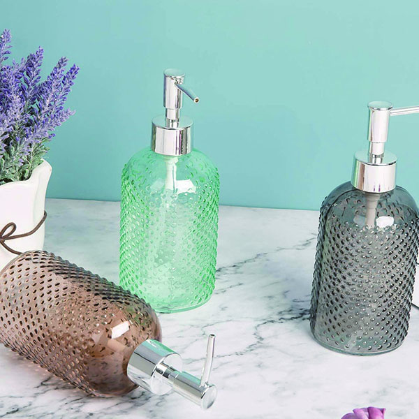 Separate glass lotion bottles