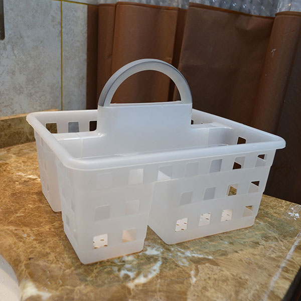 Sink caddy with soft handle